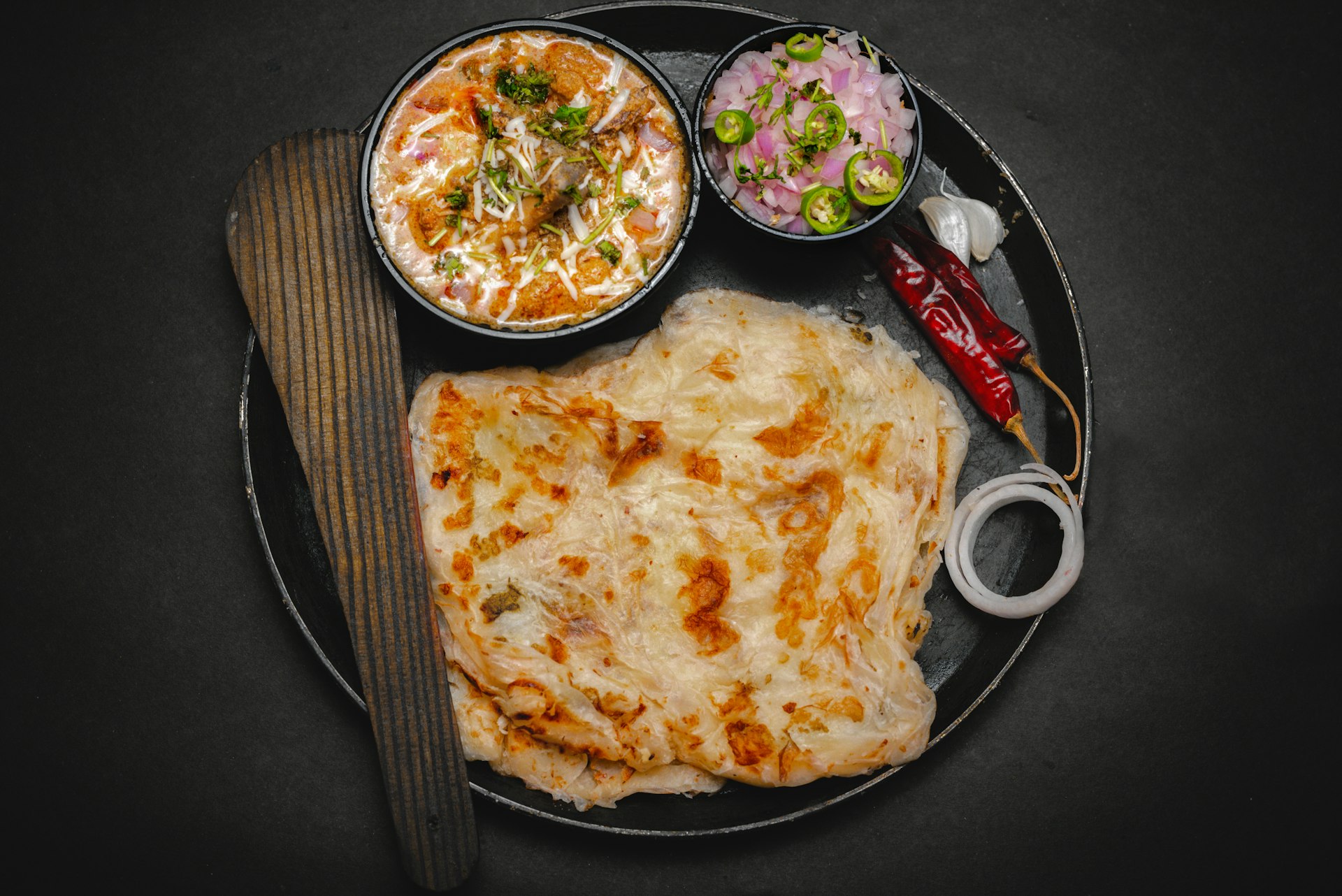 a plate of food with a fork and a knife